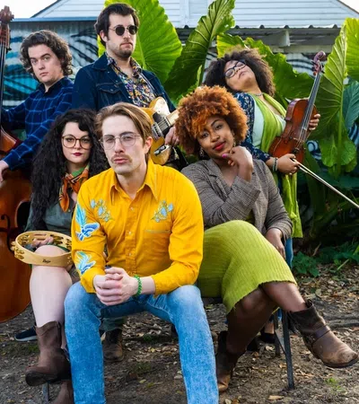 a group of people posing for a photo