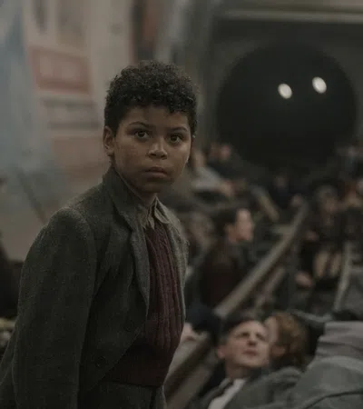 a person standing in front of a group of people