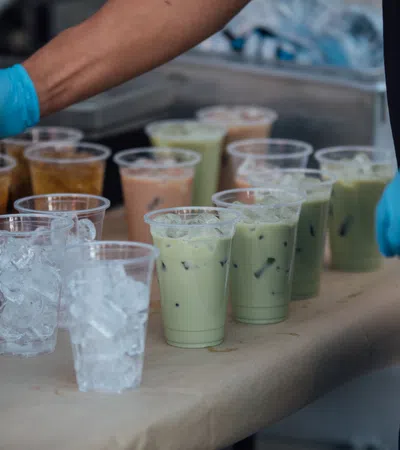 a group of glasses with liquid in them