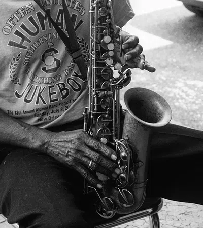 a man playing a saxophone