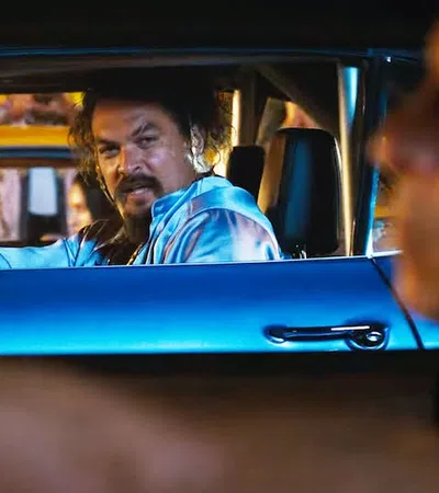 a man driving a car