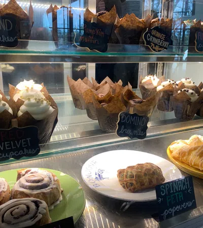 a display case with pastries