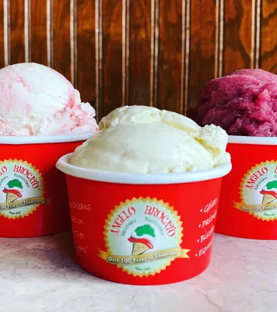 a group of red cups with ice cream in them