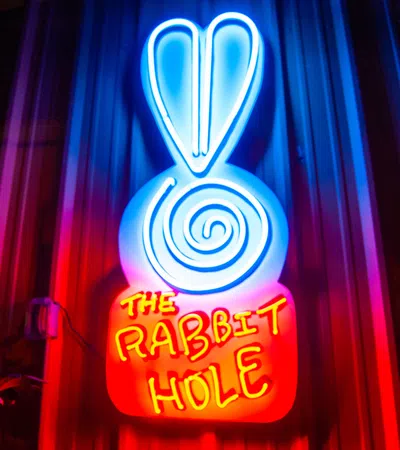 a neon sign with a blue light