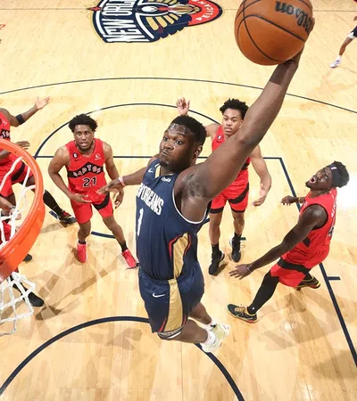 a group of men playing basketball