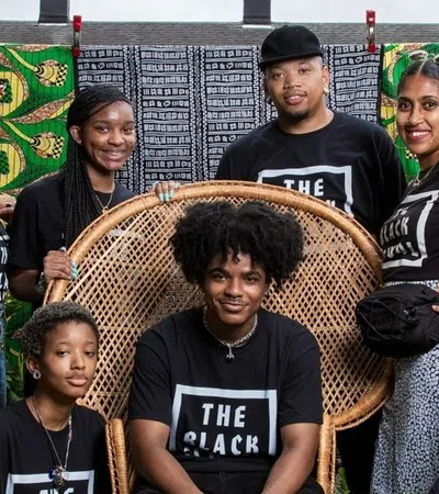 Bobb'e J. Thompson et al. posing for a photo