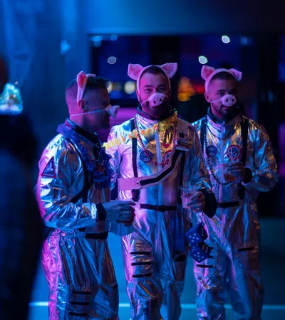a group of men wearing clothing