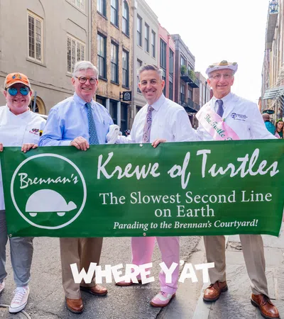 a group of people holding a sign
