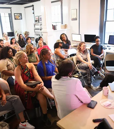 a group of people sitting in a room