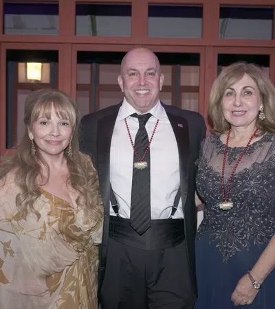 a group of people posing for a photo