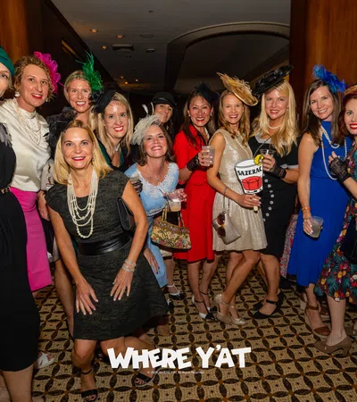 a group of women posing for a photo