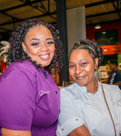 a couple of women smiling