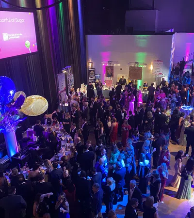 a large crowd of people at a convention