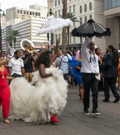 a group of people dancing in a street