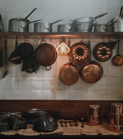 a kitchen with pots and pans