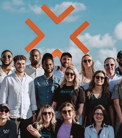 a group of people posing for a photo