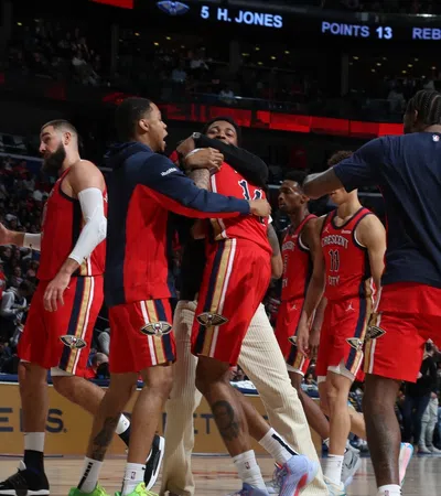 a group of men in basketball uniforms