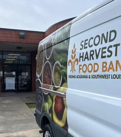 a van is parked outside a store