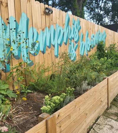 a garden with a fence