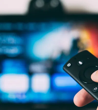 a person holding a remote control