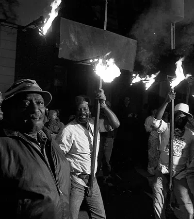 a group of people holding sparklers
