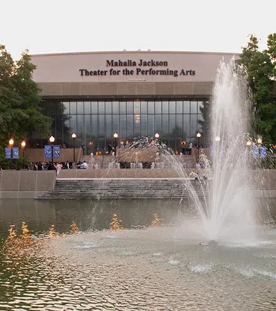 a fountain in front of a building