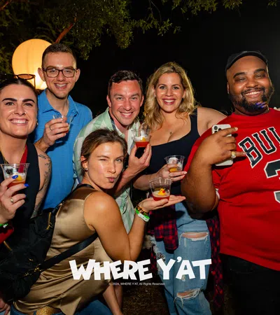 a group of people posing for a photo