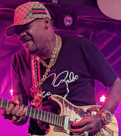 a man playing a guitar
