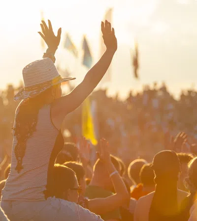 a group of people raising their hands
