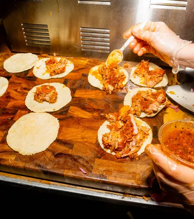a person making a pizza