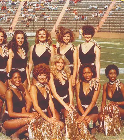 a group of women posing for a photo