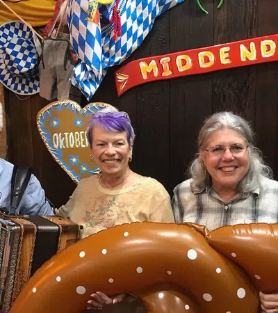 a group of people holding musical instruments