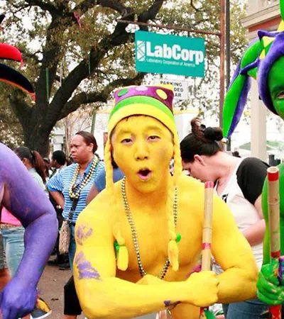 Showing  Your  Krewe  Colors: The History of  Purple, Green, and Gold