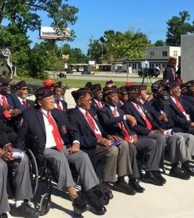 a group of people sitting in chairs