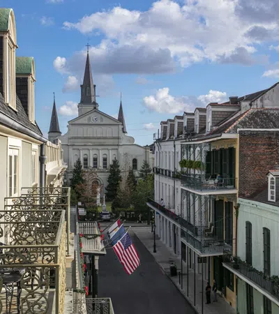 a street with buildings and a flag