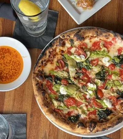 a pizza with a lot of toppings on it