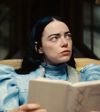 Emma Stone reading a book