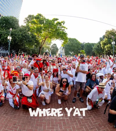 a large group of people posing for a photo