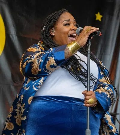 a person singing into a microphone