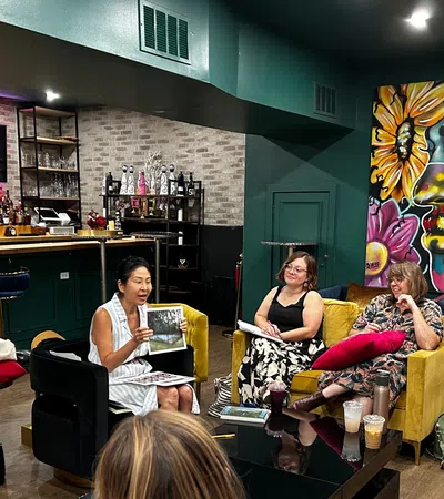 a group of people sitting in a room