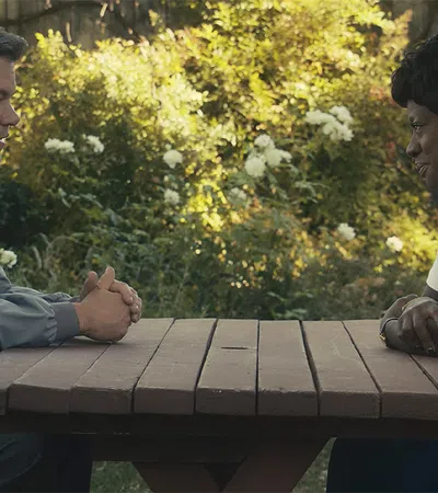 a man and a woman playing a game outside