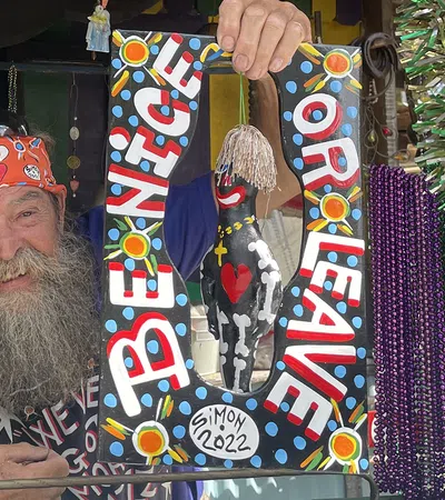 a man holding a snowboard