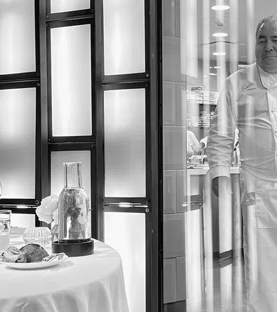 a group of chefs in a kitchen