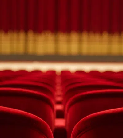 a red curtain with a yellow line
