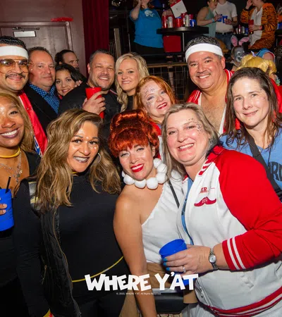 a group of people posing for a photo