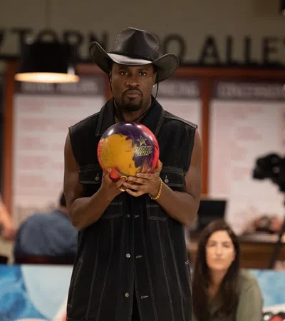 a person holding a colorful ball