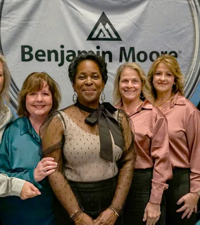 a group of women posing for a photo