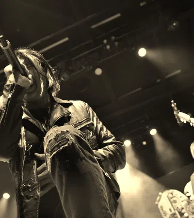 a person singing into a microphone