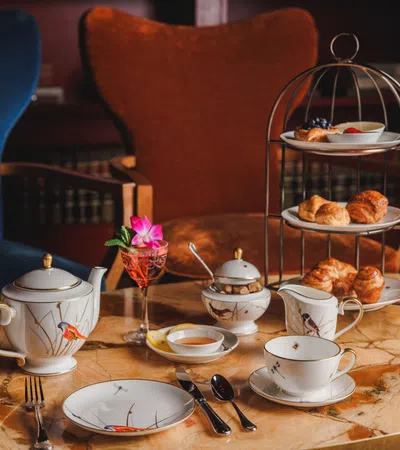 a table with plates and cups on it