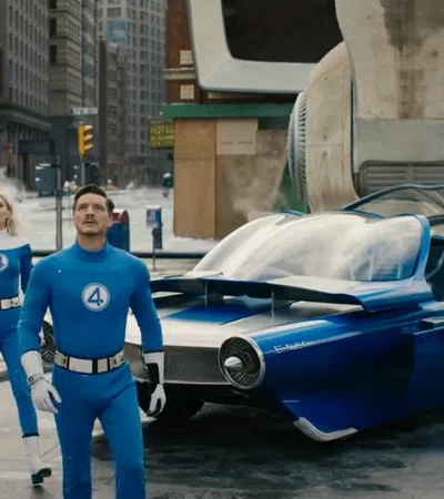 Fantastic Four superheroes in blue suits stand near their futuristic blue vehicle in a city setting.